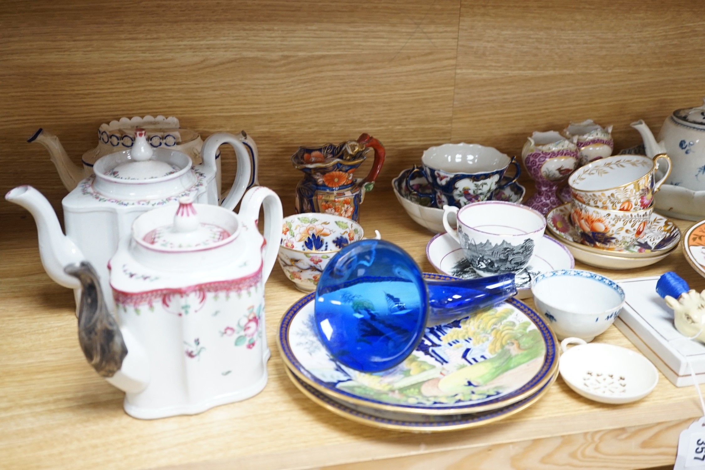 A collection of late 18th/19th century English ceramic teapots, cabinet cups, a jug, dishes and plates etc